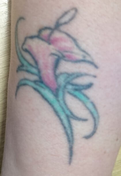 tattoo, lily-tattoo, floral-tattoo, tattoo-flowers, tattoo-coverup, cover-up, tattoo-by-thor, thor-gratts, mad-tatters, perfume-bottle, vintage-style-tattoo, peacock-feather, quarter-sleeve, wrist-tattoo, flowers-bottle-feather-tattoo