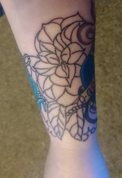 tattoo, lily-tattoo, floral-tattoo, tattoo-flowers, tattoo-coverup, cover-up, tattoo-by-thor, thor-gratts, mad-tatters, perfume-bottle, vintage-style-tattoo, peacock-feather, quarter-sleeve, wrist-tattoo, flowers-bottle-feather-tattoo