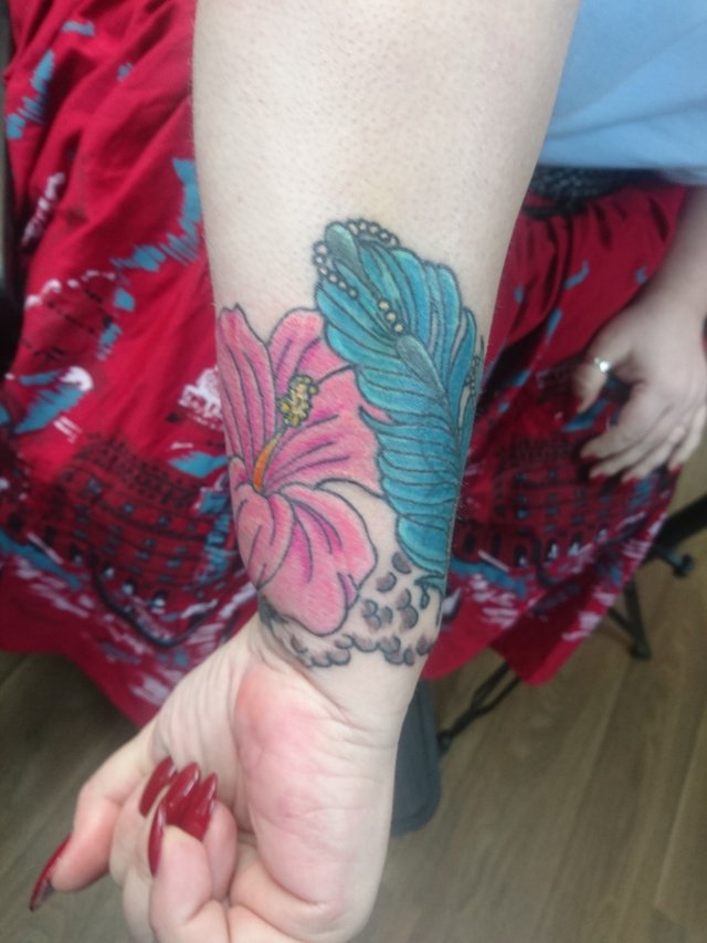 tattoo, lily-tattoo, floral-tattoo, tattoo-flowers, tattoo-coverup, cover-up, tattoo-by-thor, thor-gratts, mad-tatters, perfume-bottle, vintage-style-tattoo, peacock-feather, quarter-sleeve, wrist-tattoo, flowers-bottle-feather-tattoo, camellia, hibiscus, wrist-cuff